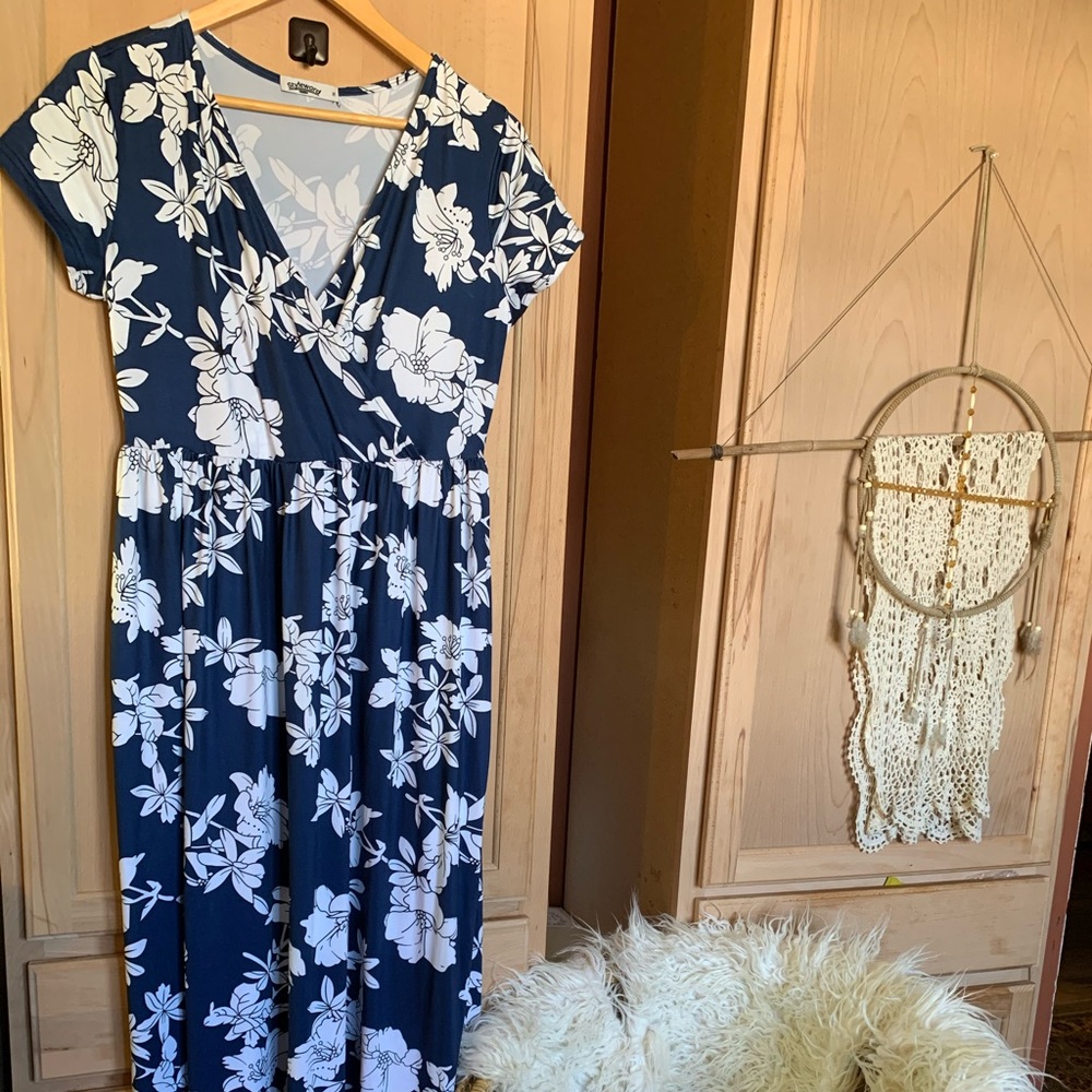 Blue & white floral maxi dress with pockets.